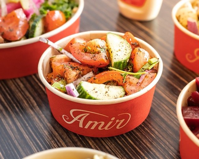 Amir food photography showing a Mediterranean pizza.